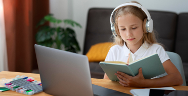 Girl learning from online class